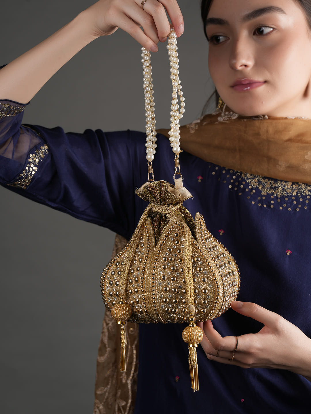 Women Gold Embellished Bridal Potli Bag with Pearl Handle & Beads Work